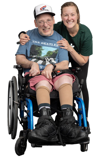target-employee-and-target-participant-enjoy-a-hug-and-pose-for-the-camera
